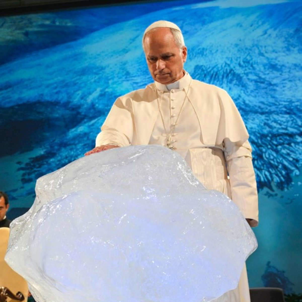 Pope Leo XIV blesses the ice block by Olafur Eliasson. Photo: Vatican Media