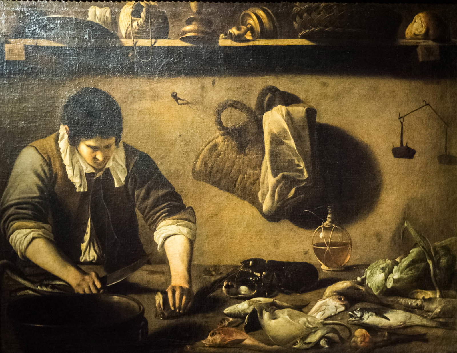 Pensionante del Saraceni, Cuoco in cucina (1615 circa; olio su tela; Firenze, Galleria Corsini)