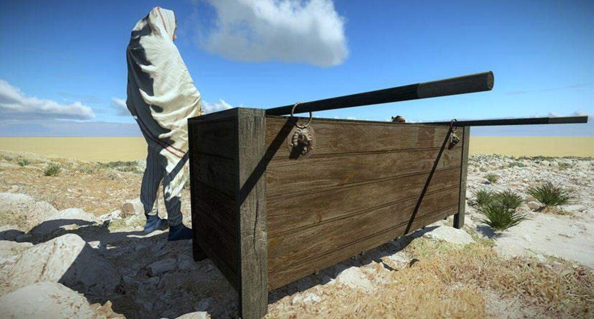 Ricostruzione dei dischi a forma di testa di leone come maniglie per trasportare una bara di legno. Illustrazione: Y. Shmidov.