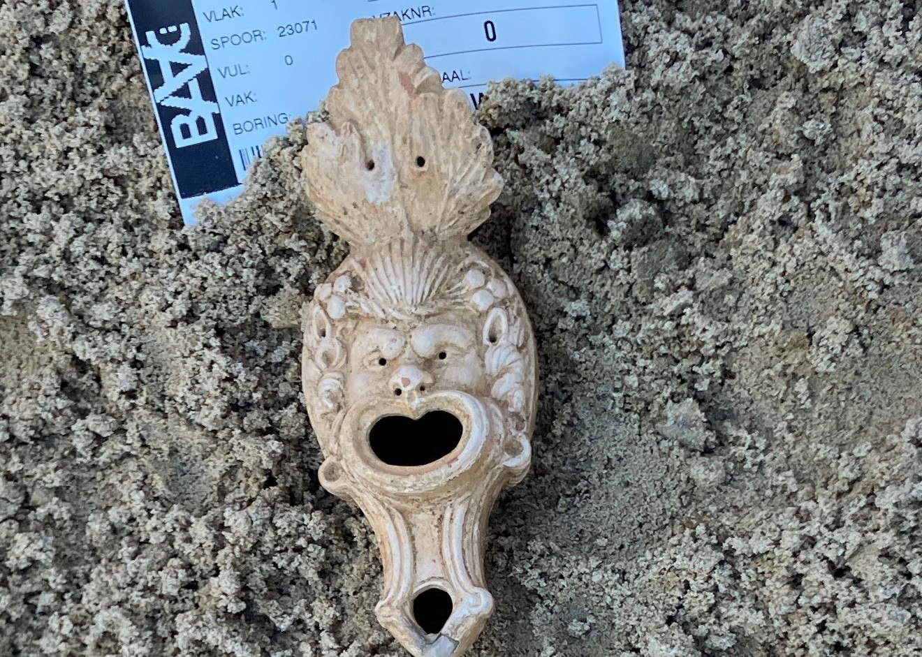 Roman lantern decorated with mask found in Cuijk. Photo: ©Gemeente Land van Cuijk