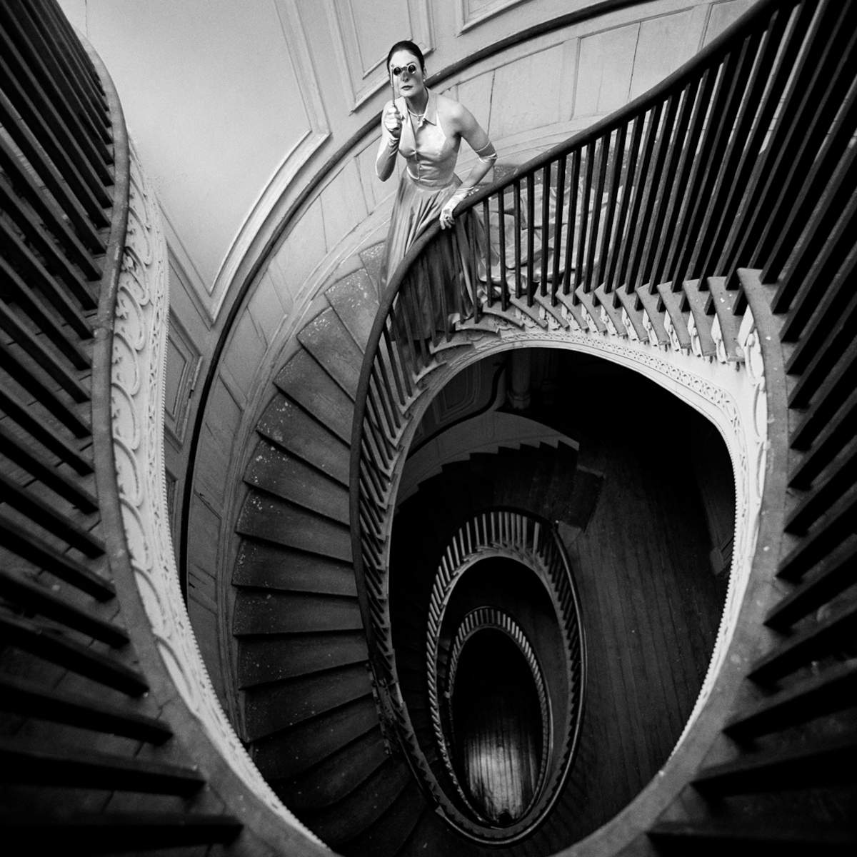 Caroline at the Top of Circular Staircase, Charleston, South Carolina, 2000 &copy; Rodney Smith