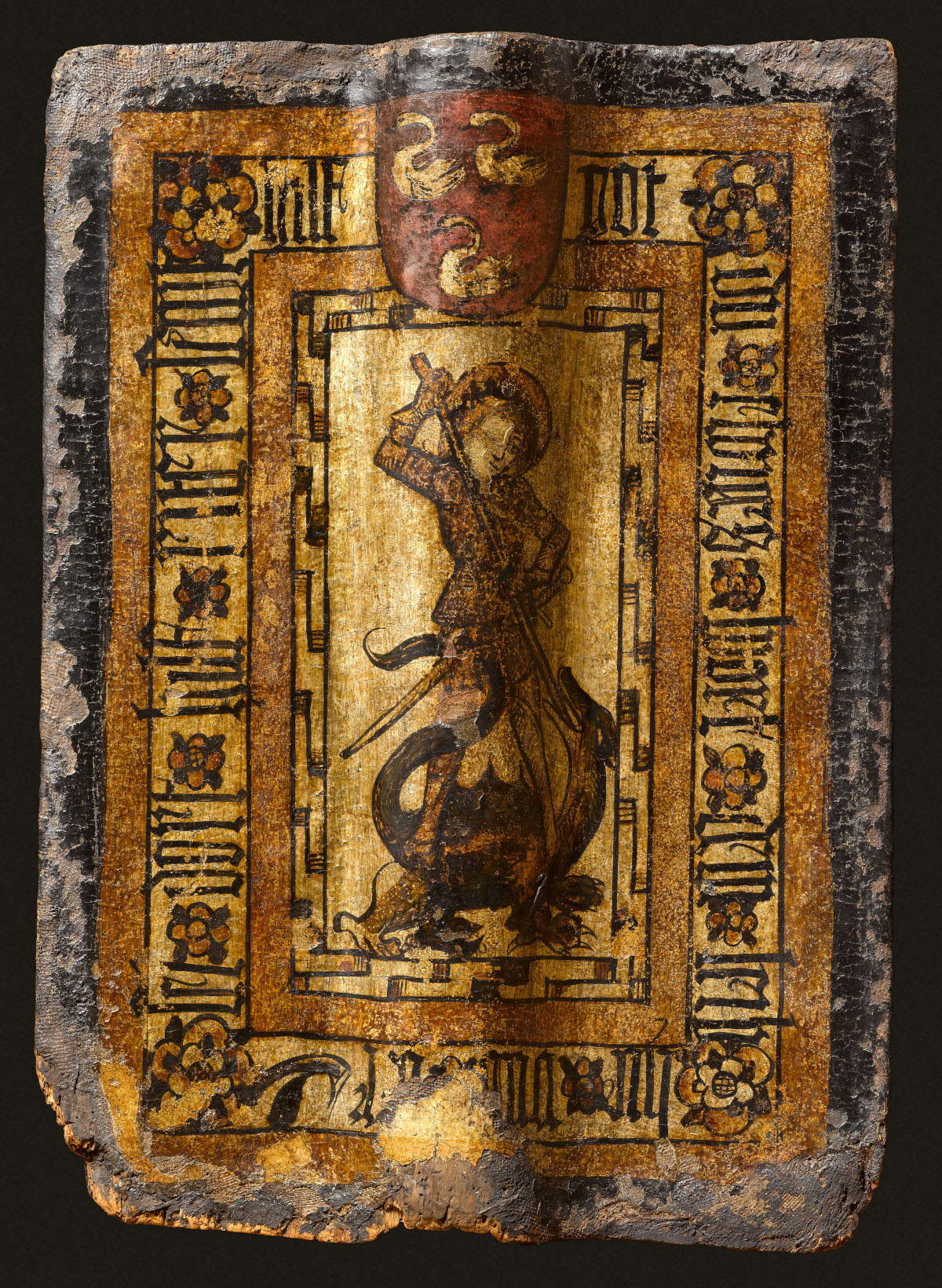 Escudo con San Jorge matando al dragón (segunda mitad del siglo XV; cuero, madera, pintura, 69 x 59 x 5,5 cm; París, Mus&eacute;e de Cluny - Mus&eacute;e National du Moyen &Acirc;ge)