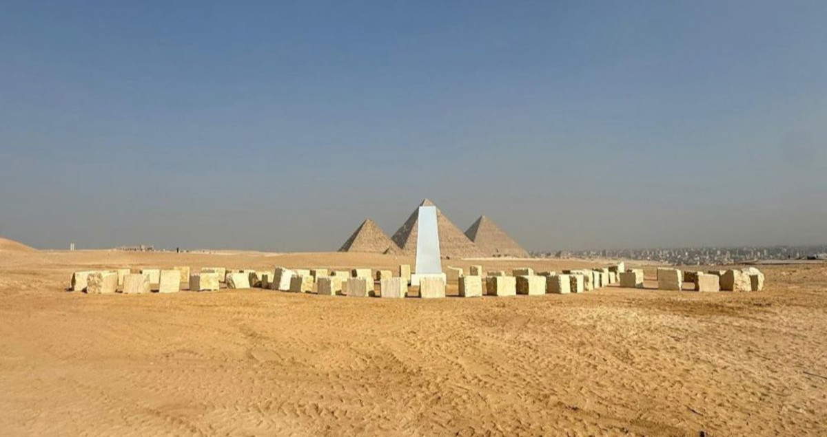 Michelangelo Pistoletto and Cittadellarte's Third Paradise in front of the Giza Pyramids. Photo: Cittadellarte Pistoletto Foundation