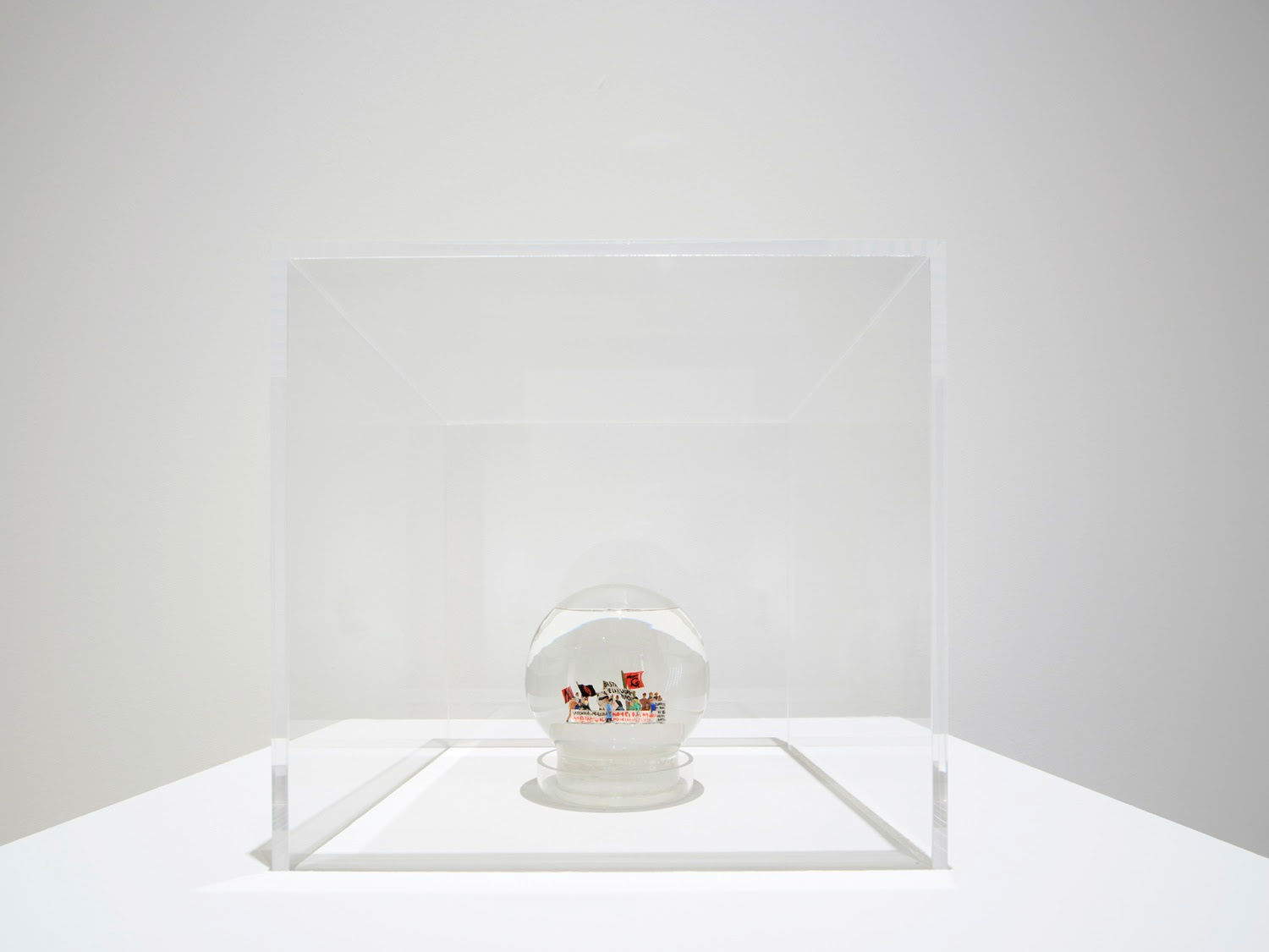 Vedovamazzei, Vedovamazzei you don't scare us we have the shot in the barrel without the safety catch! (1994; glass, plastic, distilled, 15x13x13 cm; Rome, 18th Quadriennale d'arte, Fantastica, Palazzo Esposizioni, October 11, 2025-January 18, 2026) Photo courtesy of Fondazione La Quadriennale di Roma. Photo: Agostino Osio - High Floor