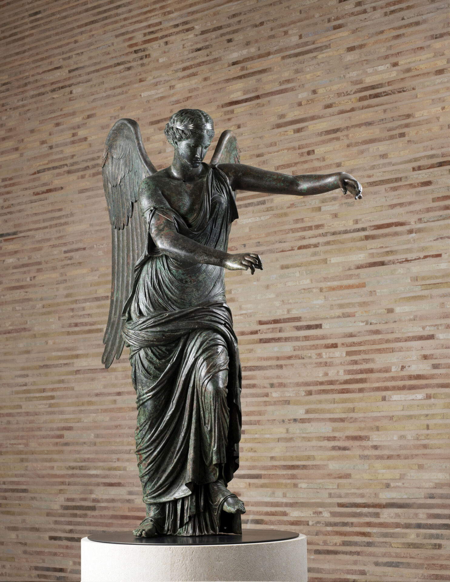 Winged Victory of Brescia (Second half 1st century AD, bronze, Brixia. Archaeological Park of Roman Brescia - Capitolium. Brescia Musei Foundation, inv. no. MR369) &copy; Brescia Museums Photographic Archives | Fotostudio Rapuzzi