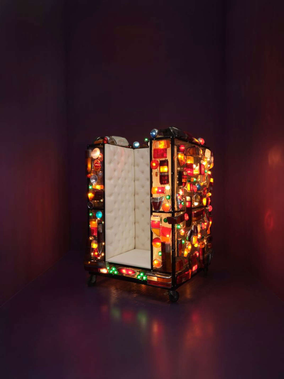 Joana Vasconcelos, Strangers in the night (2000; car lights, quilted nappa leather, painted iron, electrical system, sound system with song Strangers in the night performed by Frank Sinatra, 237 &times; 174 &times; 177 cm; EDP Foundation Art Collection)