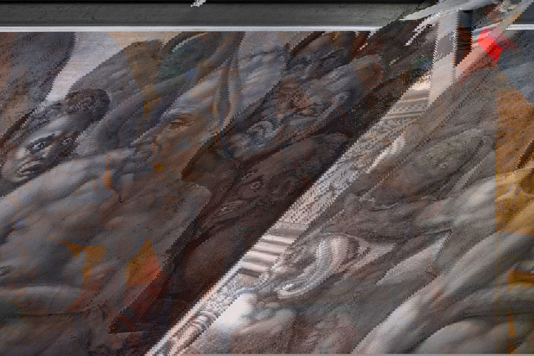 Chapelle Sixtine, Jugement dernier, détail du groupe autour de Minos : l'élimination de la patine blanchâtre et la récupération du clair-obscur original sont visibles. Copyright &copy; Governatorato SCV - Direzione dei Musei. Tous droits réservés.