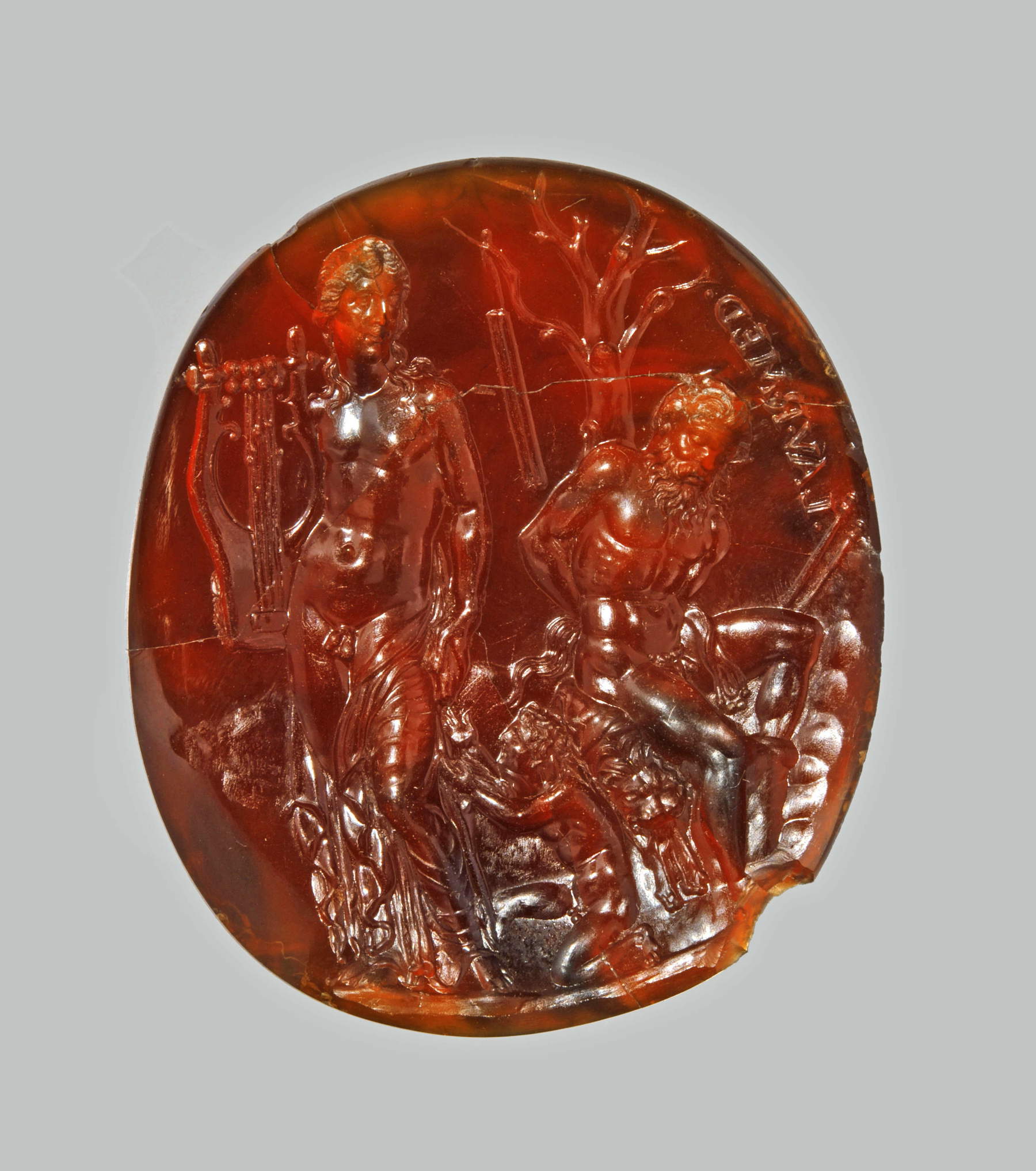 Attribuito a Dioskourides, Apollo, Marsia e Olimpo, c.d. &ldquo;Sigillum Neronis&rdquo; (fine del I sec. a.C.- inizio del I sec. d. C.; intaglio in corniola; MANN - Museo Archeologico di Napoli)