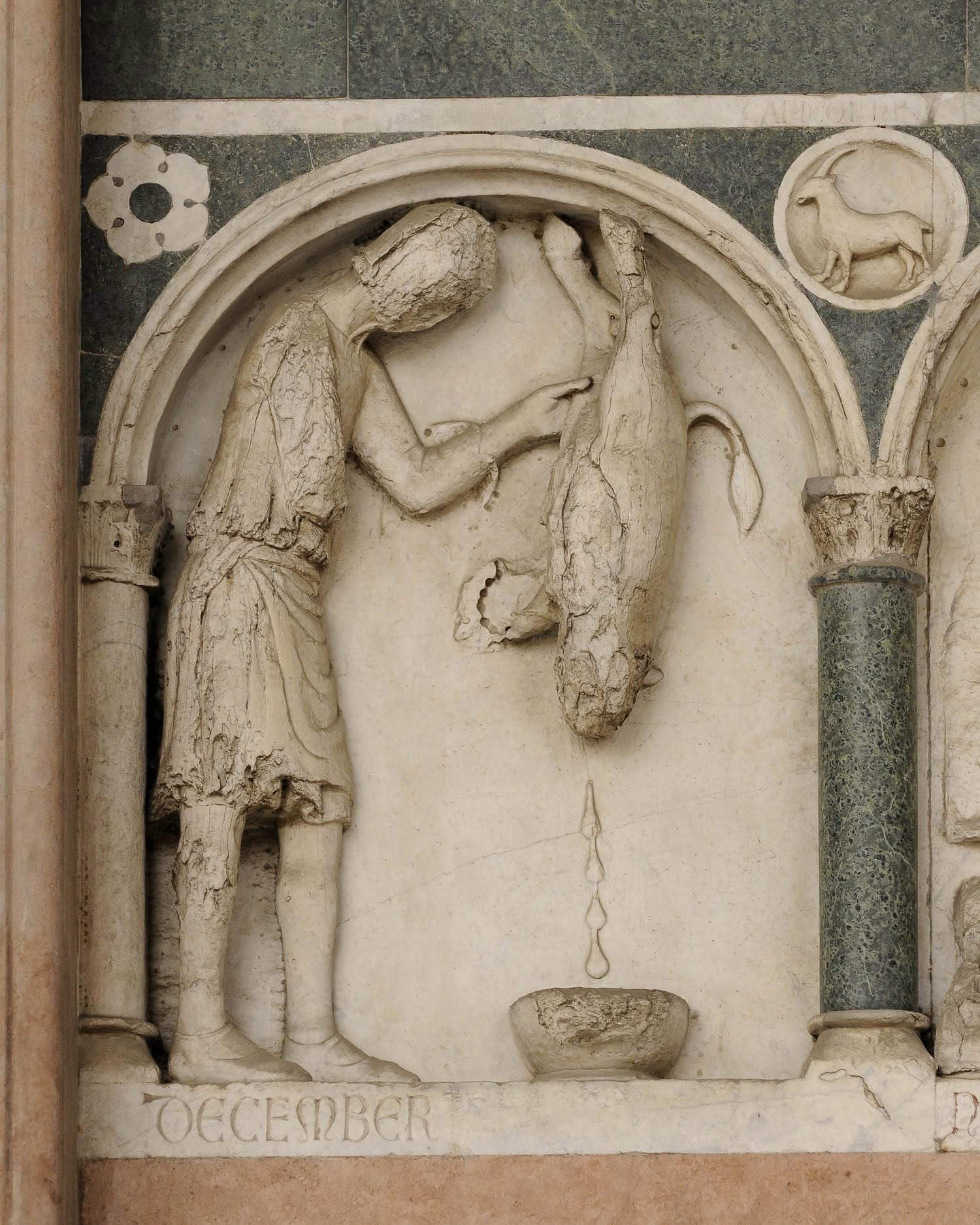 Zyklus der Monate: Dezember. Foto: Museumskomplex des Doms von Lucca