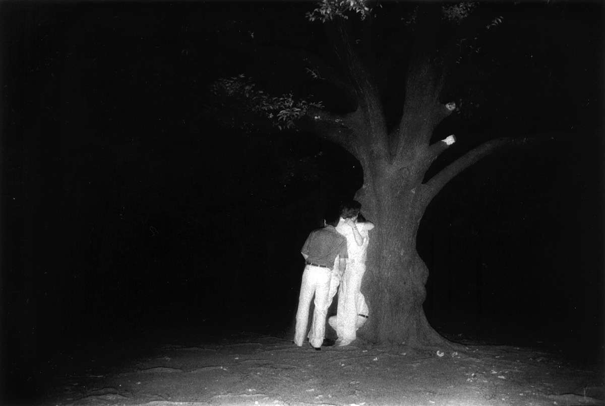 Kohei Yoshiyuki, *The Park* (1979; silver gelatin print, 40.5 x 51 cm)