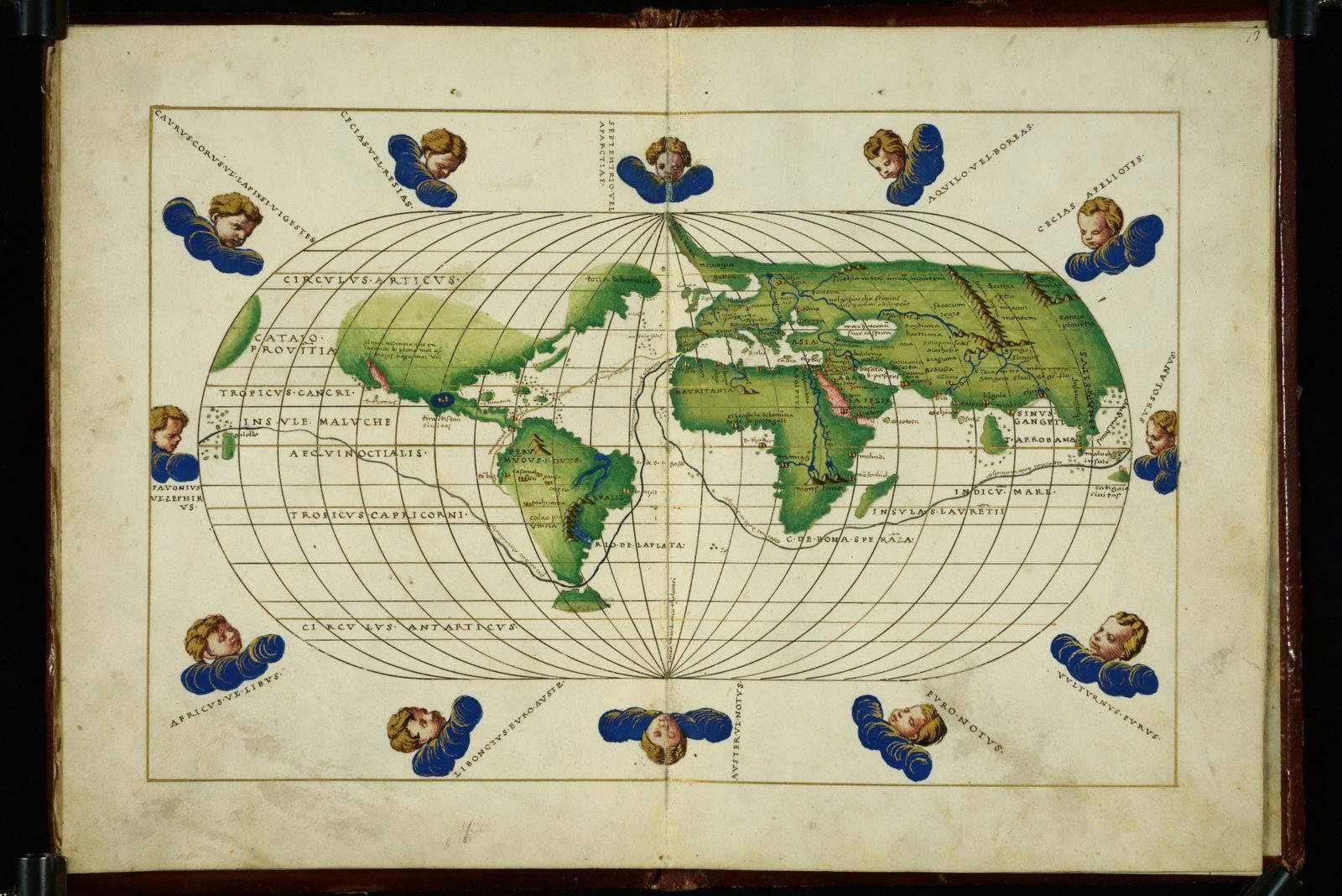 Planisfero en proyección oval con las caras de los vientos en las esquinas, en un atlas manuscrito e iluminado. Se trazan las rutas de circunnavegación y las costas del Nuevo Mundo (Brasil, Perú, Tierra de Bacalaos), de África y de Asia. (BML, Med. Palat. 245)