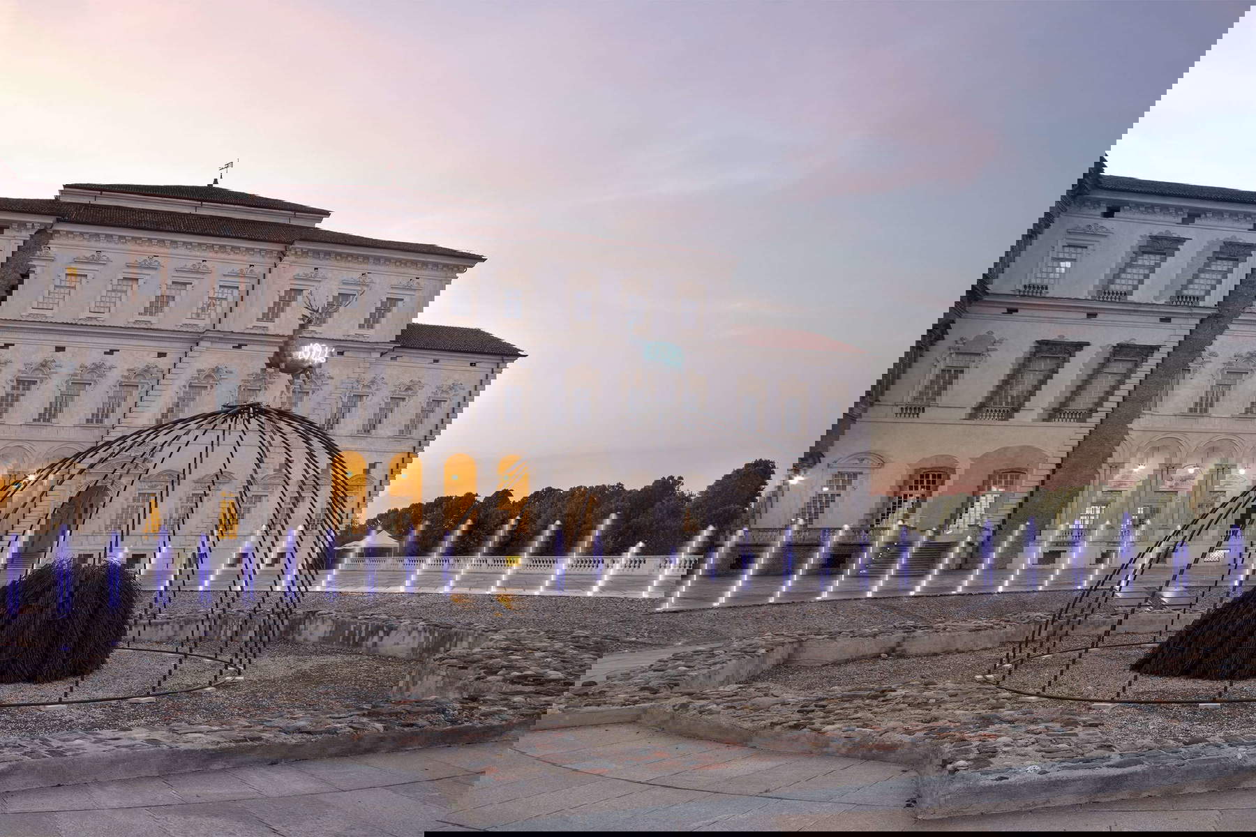 Mario Merz, Untitled (Double igloo in Porto) (1998; metal structure, bundles, aluminum casting, neon, 647 x 800 cm; Merz Collection). Photo: Renato Ghiazza