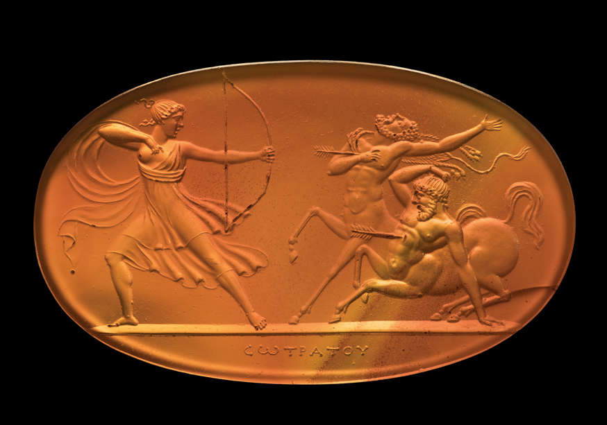 Amazon Against the Centaurs (Rome, 1803/1804–1826; carved carnelian, 24.8 &times; 41.3 mm). Inscription: “C&omega;&Tau;&Rho;&Alpha;&Tau;&Omicron;&Upsilon;” (SOTRATOU)