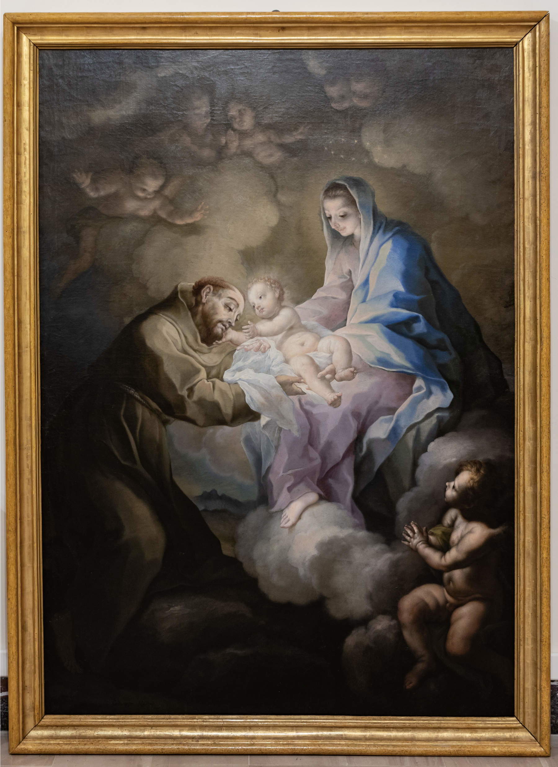Giuseppe Nicola Nasini, «Visión de San Francisco a quien la Virgen ofrece al Niño Jesús» (Óleo sobre lienzo, 176 x 126,5 cm). Asís, Custodia General, Sacro Convento de San Francisco en Asís de los Frailes Menores Conventuales
