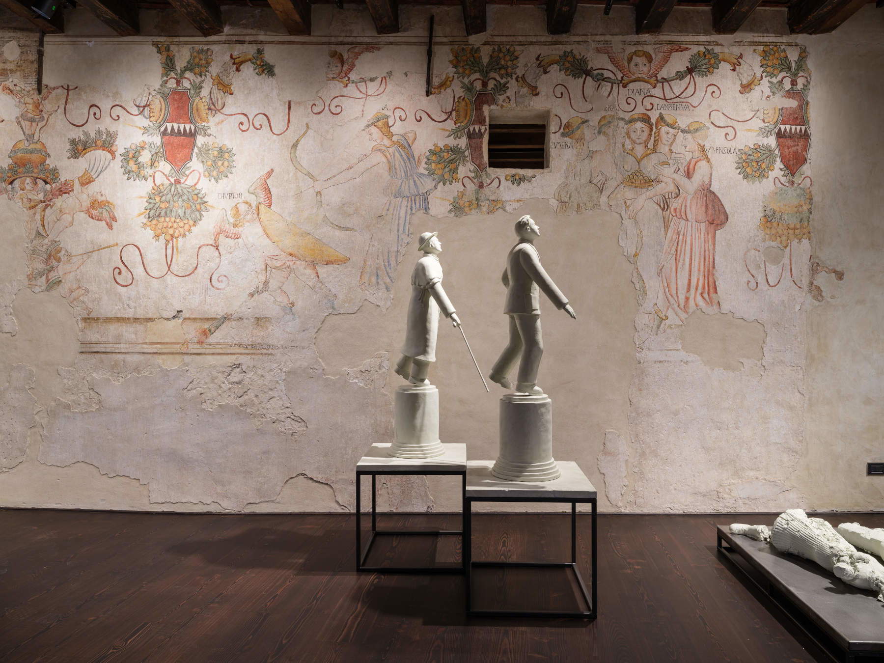 Grisha Bruskin, view of the installation *In bilico* (2001–2003), with frescoes by Giovanni Cavazza in the background. Photo: Andrea Avezz&ugrave;;