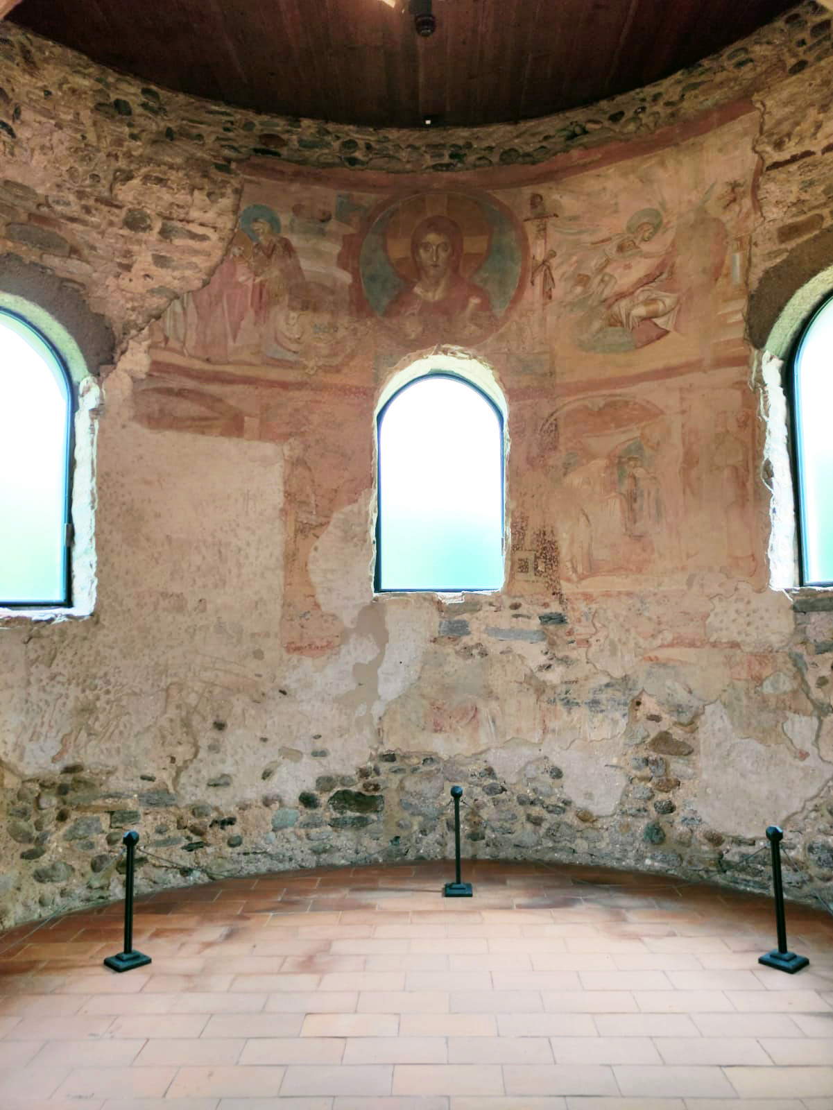 The interior of the Church of Santa Maria foris portas in Castelseprio, with the apse featuring a cycle of frescoes &copy; Ministry of Culture, all rights reserved