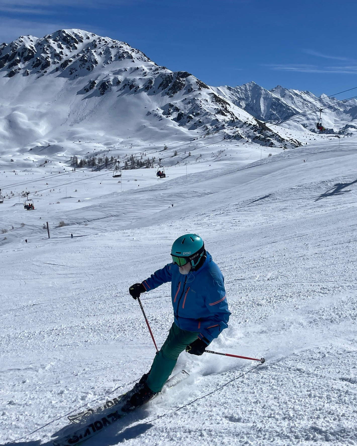Michelangelo Pistoletto in a blue ski suit. Photo from Michelangelo Pistoletto's Instagram profile.