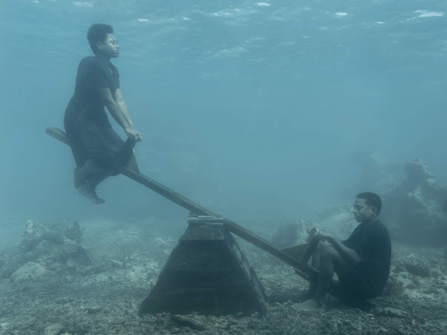 Nick Brandt, Onnie and Keanan on Seesaw, Fiji (2023) &copy; Nick Brandt