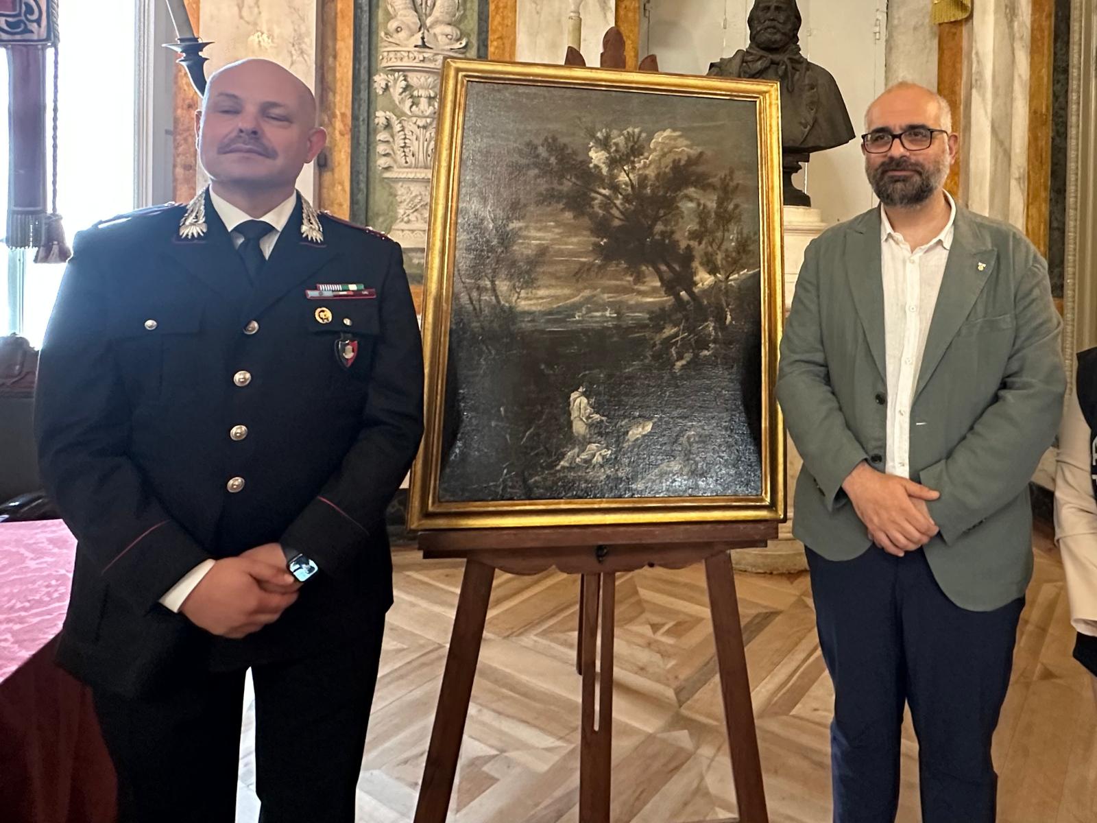 L'assessore alla Cultura,&nbsp;Giacomo Montanari con il comandante del Nucleo Carabinieri per la Tutela del Patrimonio Culturale di Genova Alessandro Caprio e l&rsquo;opera I Frati Camaldolesi di Alessandro Magnasco.