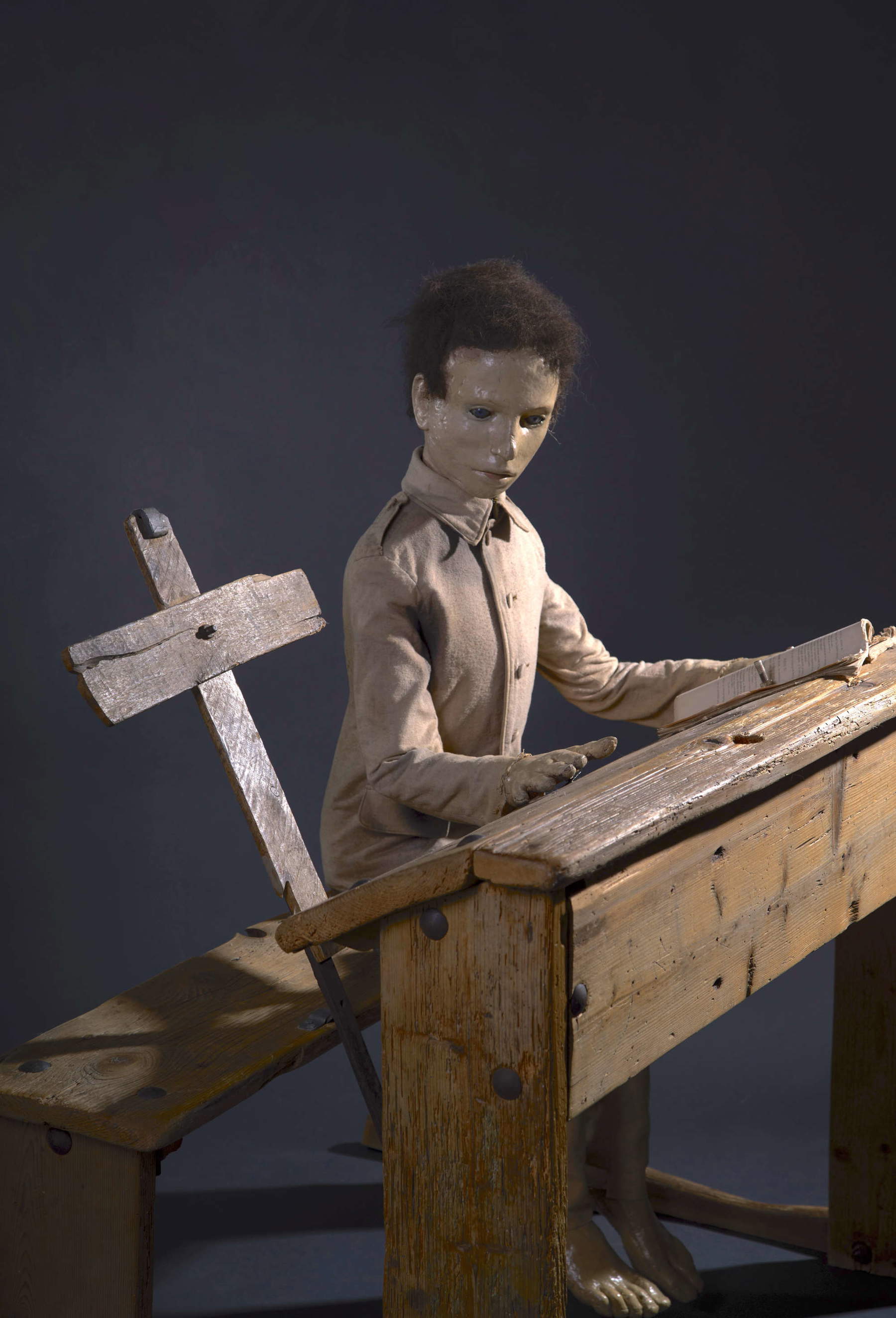 Tadeusz Kantor, Bench (The Dead Class) (1975-1982; author's technique: wood, metal, synthetic material, cloth, natural hair, 108 &times; 88 &times; 117 cm; Starak Collection). Photo: Bozzy and Savary courtesy of Galerie Kal&eacute;idoscope. Courtesy of &copy; Lech Stangret &amp; Dorota Krakowska / Tadeusz Kantor Foundation.