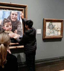London: They attached a photo of a mother from Gaza to a Picasso and defaced the floor&mdash;the culprits