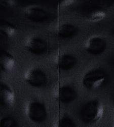 At Unipol Tower in Milan, Alberto Burri in dialogue with five creations of contemporary Japanese fashion