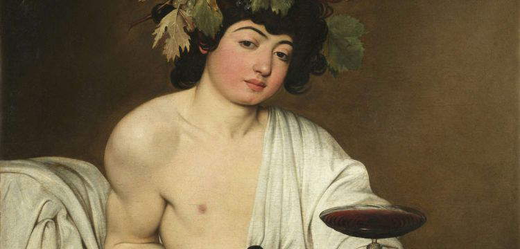 Il vino di Caravaggio: cosa significa il calice offerto dal Bacco degli Uffizi